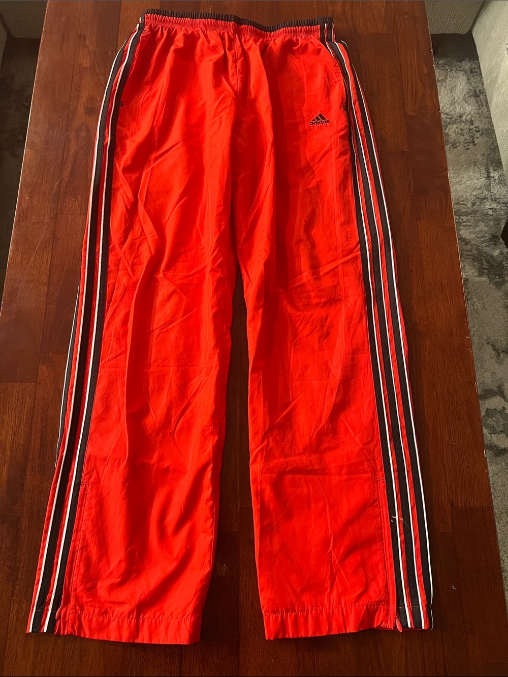 adidas women’s Bright Red Joggers with Black & White Side Stripes